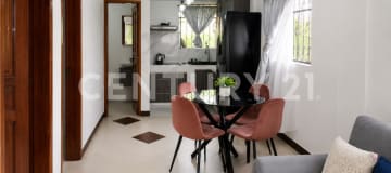 Terreno 884m² en Sangolquí: casa + huerto, uso residencial o comercial