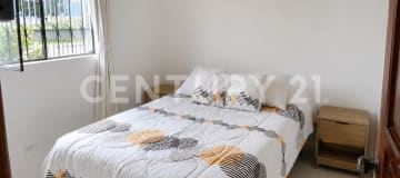 Terreno 884m² en Sangolquí: casa + huerto, uso residencial o comercial