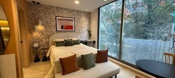 Venta Departamento piso 17 de 2 Habitaciones. Sector La Carolina. Av Shyris. IR