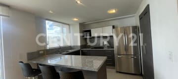 Depto. 110m2 amoblado en González Suárez - 2 dorm. y balcón