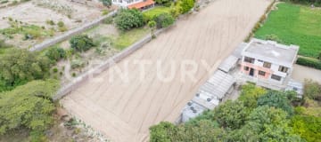Terreno 2300m² en San Antonio Pichincha con vista y servicios