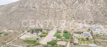 Terreno 2300m² en San Antonio Pichincha con vista y servicios