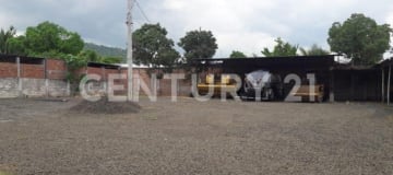 Terreno con cerramiento en zona de alto crecimiento urbano
