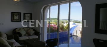 Departamento frente al mar con piscina privada en urbanización exclusiva