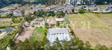 Propiedad productiva 11,224m² con invernaderos y acceso E35