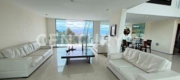 Casa de autor premiada en Campo Alegre con vista al valle